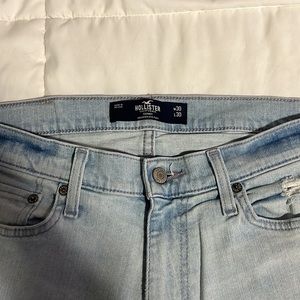 Hollister light blue wash/distressed jeans.